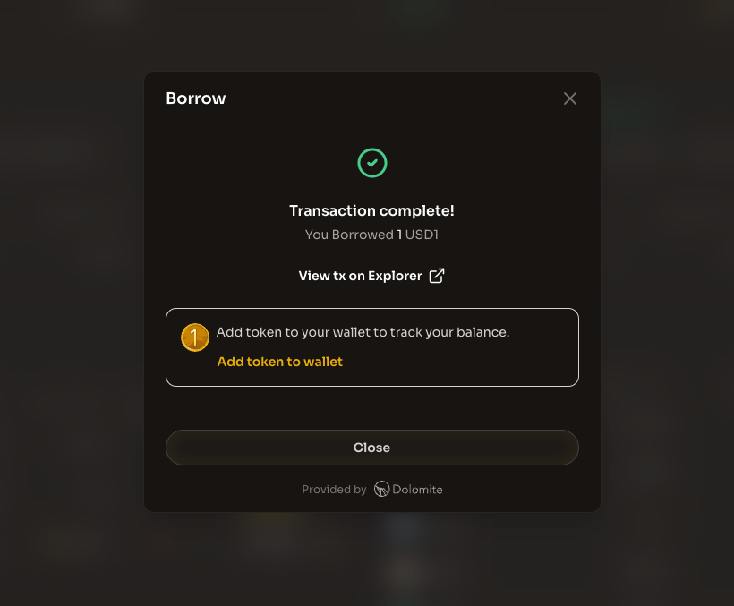 Transaction complete modal showing successful borrow with option to add token to wallet