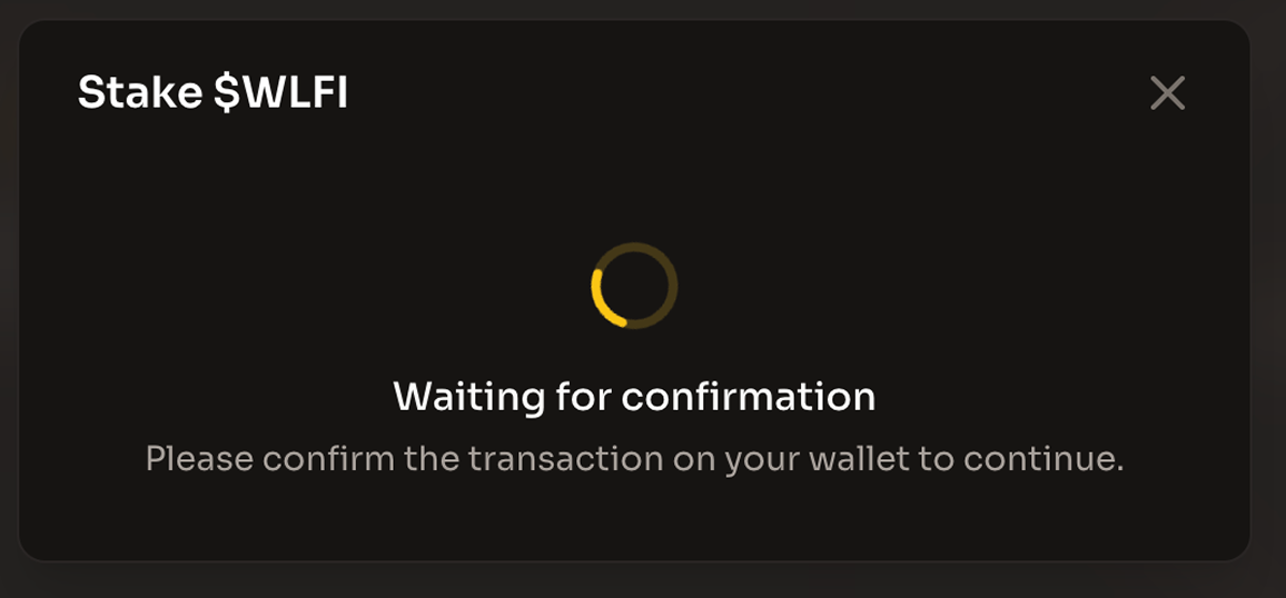 The Stake $WLFI dialog showing Waiting for confirmation while you confirm the transaction in your wallet