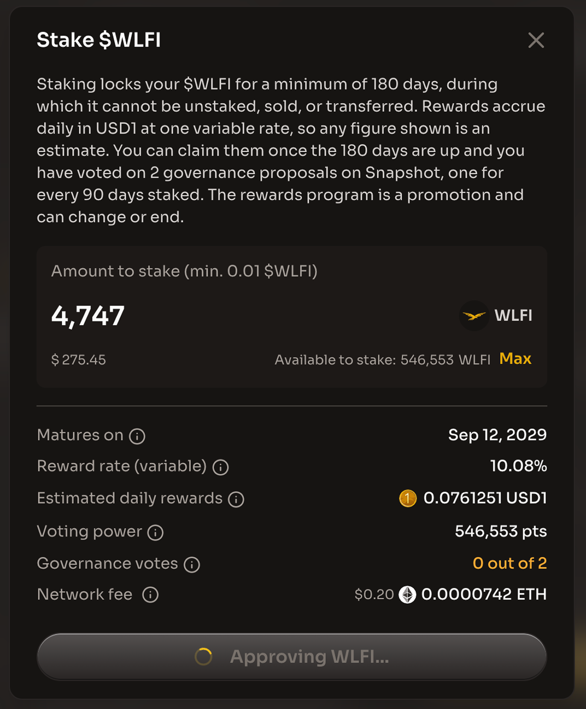 The Stake $WLFI dialog while the approval is pending, with the button reading Approving WLFI...