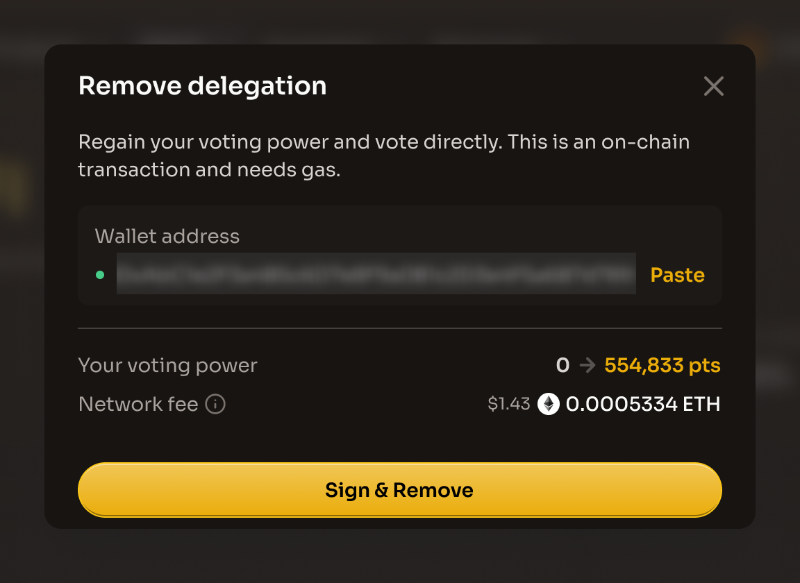 The Remove delegation dialog showing the delegate's wallet address, the Your voting power row, and the Sign and Remove button